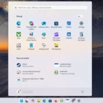 Giao diện Windows 11 với biểu tượng Copilot trên thanh tác vụ và menu Start.