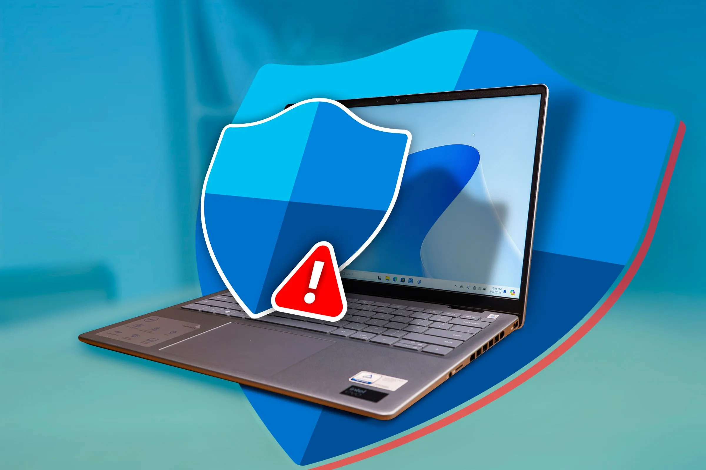 Laptop hiển thị logo Windows Defender nổi lên từ màn hình.