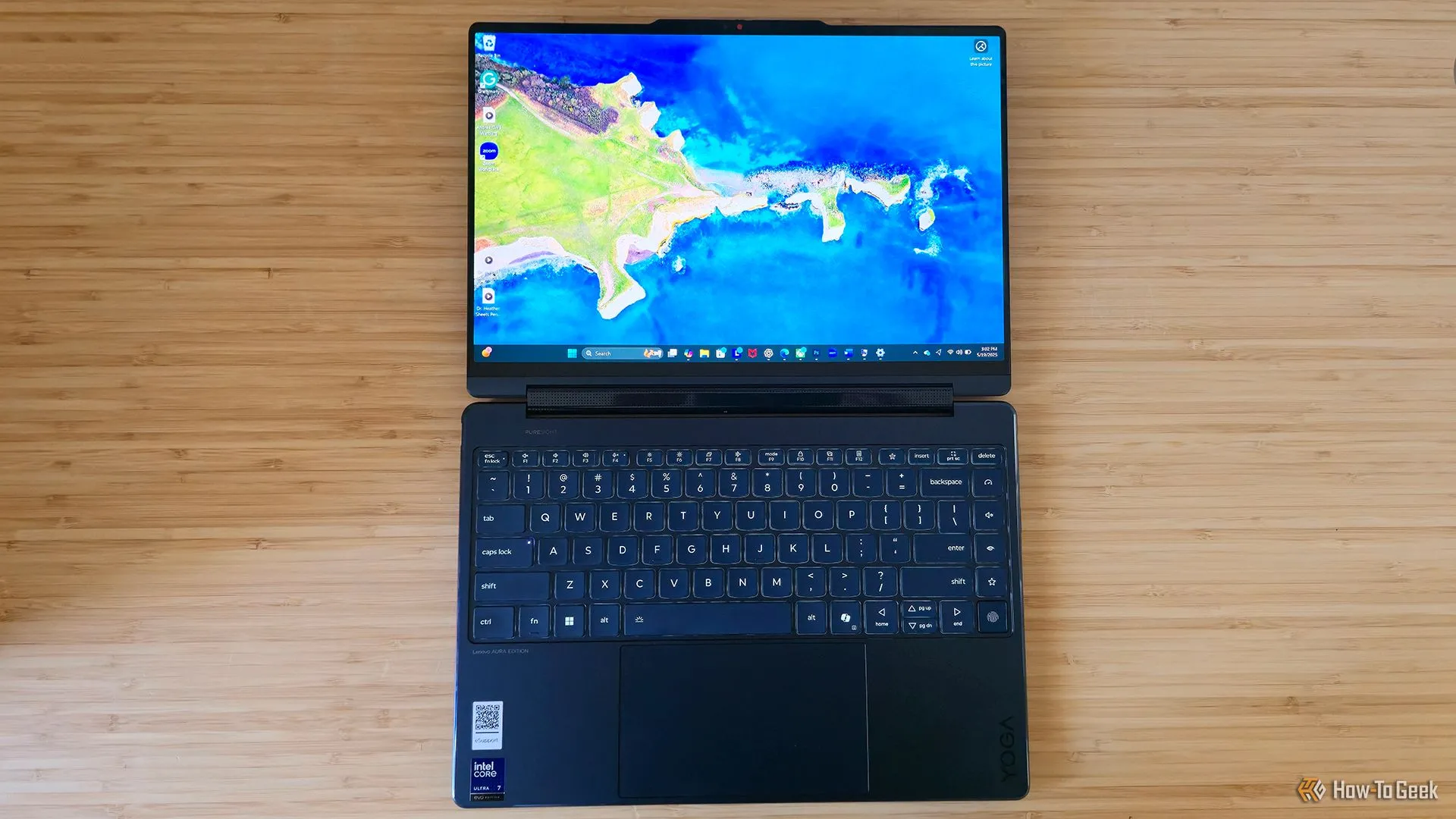 Laptop Lenovo Yoga 9i 2-in-1 Gen 10 với thiết kế đa năng, nằm phẳng trên mặt bàn, tượng trưng cho các tính năng vượt trội và linh hoạt của một chiếc laptop hiện đại.