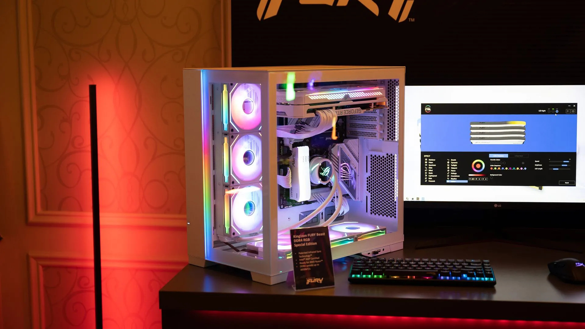 Một chiếc máy tính PC gaming với bộ nhớ Kingston, quạt RGB, đèn và card đồ họa GeForce RTX, đại diện cho chi phí phần cứng cao của PC.