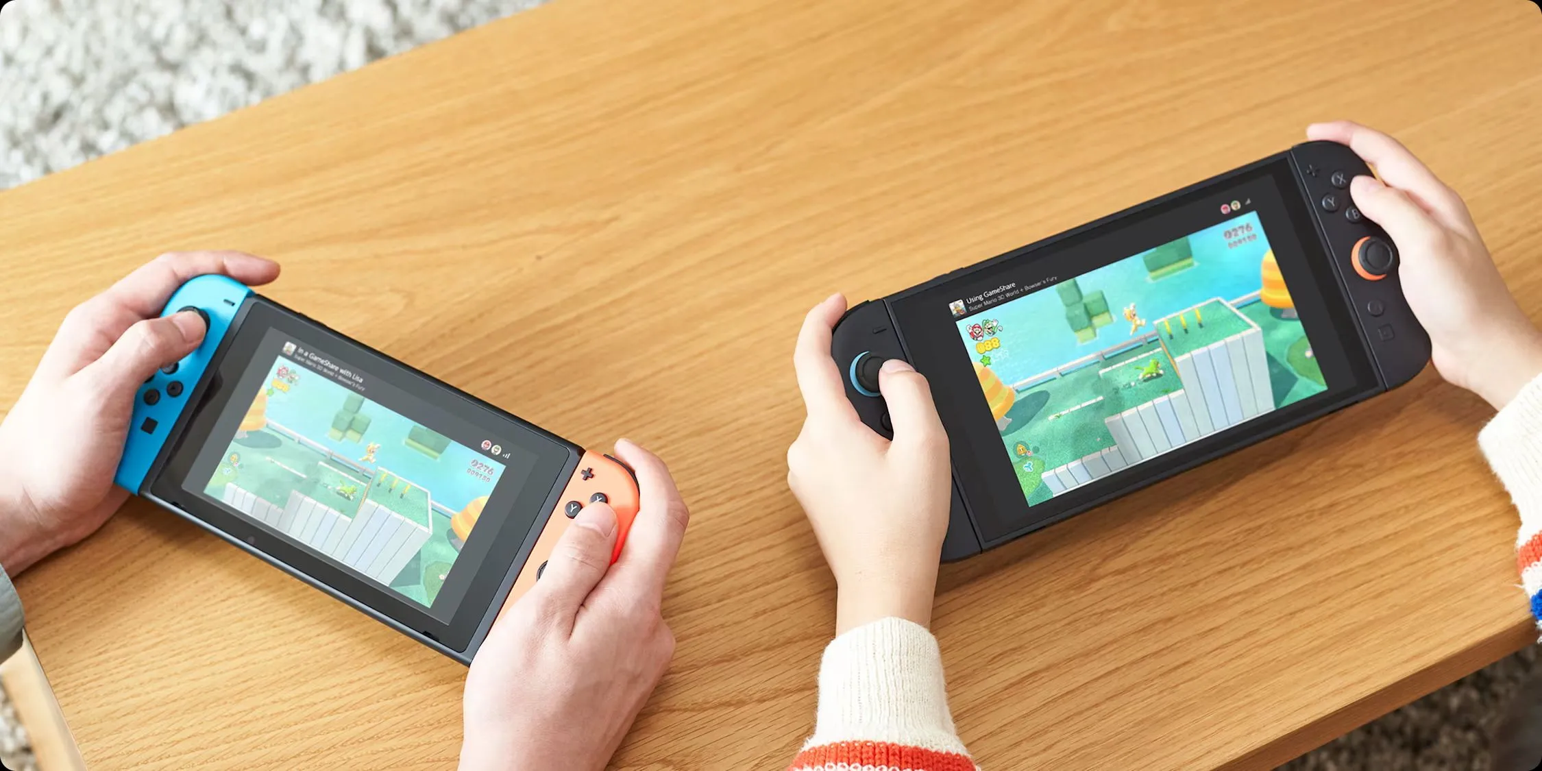 Một Switch 2 đang sử dụng GameShare với một Switch 1.