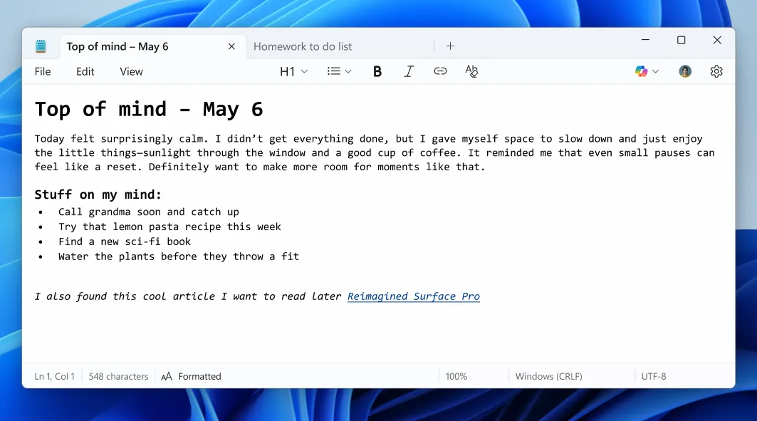 Notepad trên Windows 11 với tính năng định dạng Markdown và thanh công cụ chỉnh sửa văn bản.
