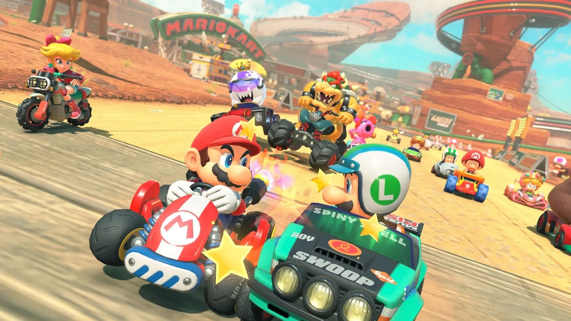 Toad và Yoshi trên đường đua trong một khu rừng với các vật phẩm tăng sức mạnh